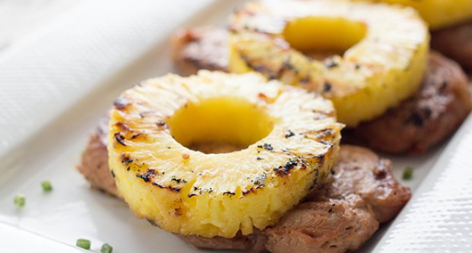 These Pork Chops Have Been Grilled & Marinated With Pineapple & Teryaki Sauce
