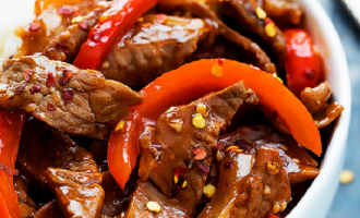 This Tender Asian Beef Is Stir-Fried In An Addictive Sweet & Spicy Sriracha Orange Sauce!