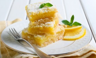These Lemon Bars Have A Creamy Cookie Crust On Top & Are Dusted With Sugar… They Are Surprisingly Zesty & Refreshing!