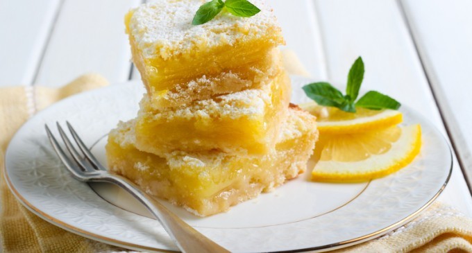 These Lemon Bars Have A Creamy Cookie Crust On Top & Are Dusted With Sugar… They Are Surprisingly Zesty & Refreshing!
