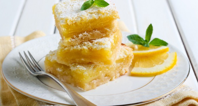 These Lemon Bars Have A Creamy Cookie Crust On Top & Are Dusted With Sugar… They Are Surprisingly Zesty & Refreshing!
