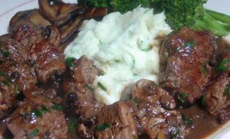 Homemade Garlic Mashed Potatoes Served With Tender Sirloin Tips