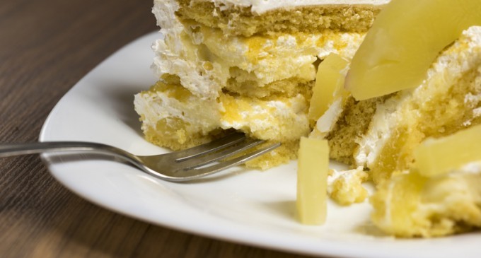 Pineapple Poke Cake With Pineapple Sauce & Cream Cheese Frosting