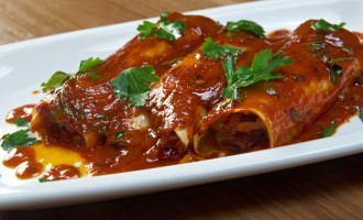 These Rojo Enchiladas Are Made Extra Special & Have A Secret Ingredient Baked Right In The Sauce!