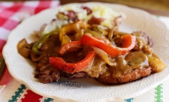 The Best Way To Serve Pork Chops Is Smothered & Covered With A Delicious Pepper Gravy