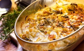 These Cheesy, Garlicky Au Gratin Potatoes Are Unlike Anything We’ve Ever Had Before; The Creamy Sauce Is Incredible!