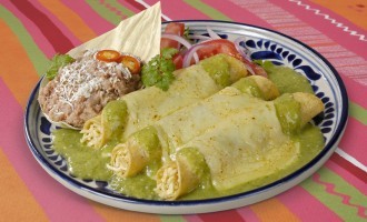 These Enchilada’s With A Spicy Green Chili Sauce Might Look Traditional But We’ve Added Something Different