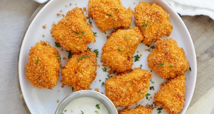 These Tortilla Chip-Crusted Chicken Bites Have A Secret Ingredient Baked In That Makes Them Super Addicting!