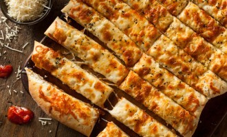 These Cheesy Oven Bread Sticks Are Our New Favorite Thing To Serve With Dinner