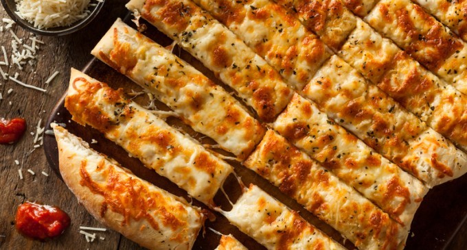 These Cheesy Oven Bread Sticks Are Our New Favorite Thing To Serve With Dinner