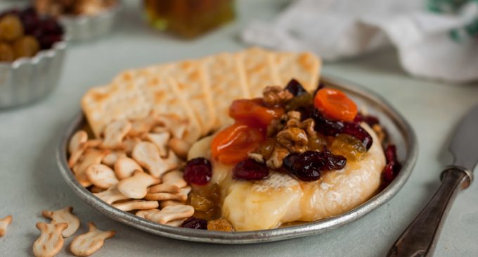 This Brie Cheese Topped With The Most Delicious Cranberry Walnut Fruit Compote Makes A Wonderful Appetizer!