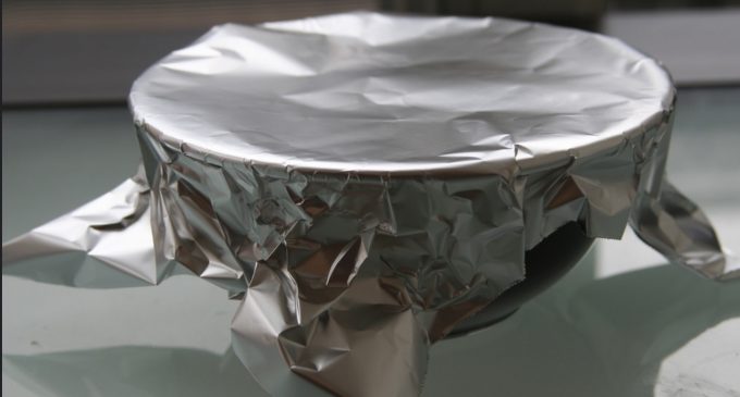 The Shocking Reason Everyone Needs To Stop Cooking With Aluminum Foil