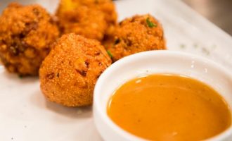 These Bacon Corn Hushpuppies With A Honey Sriracha Dipping Sauce Are The Perfect Treat