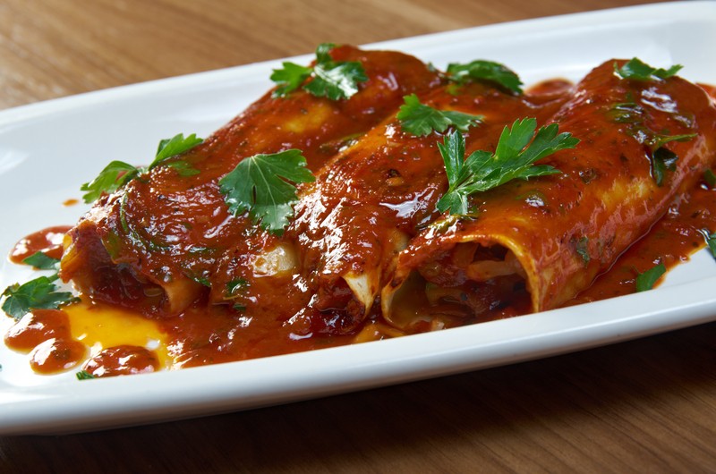 These Rojo Enchiladas Are Made Extra Special & Have A Secret Ingredient